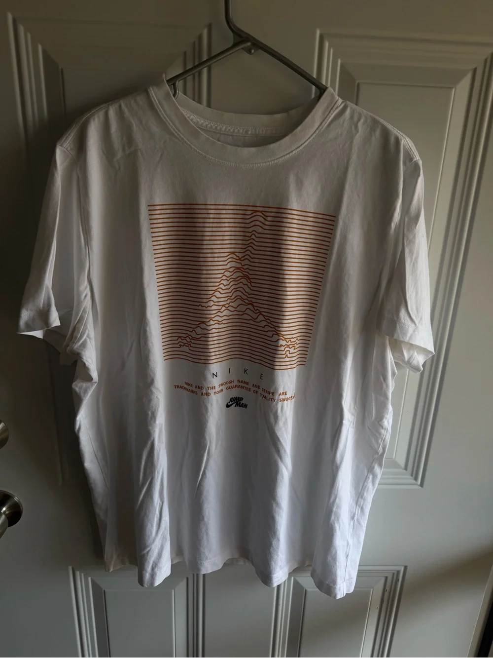 Jordan White Short-Sleeve Tee with Orange Graphic
